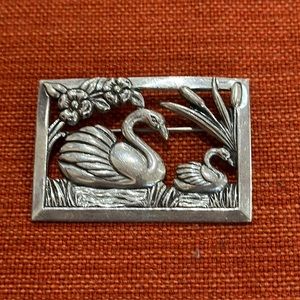 Vintage sterling silver brooch with swans